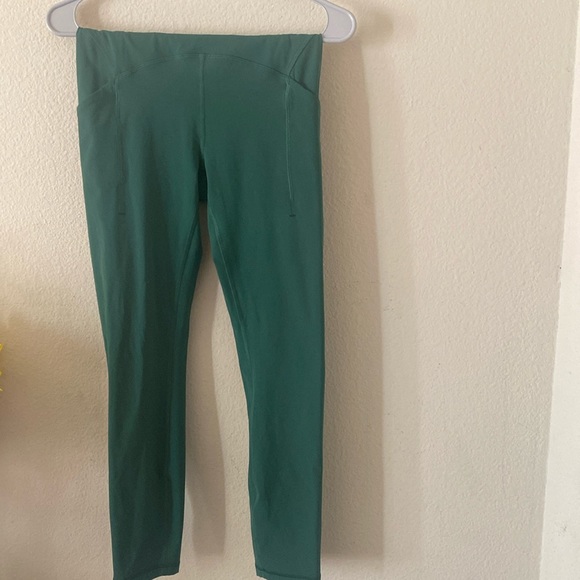 Lululemon green leggings. They have pockets. Never been worn. - Picture 1 of 4